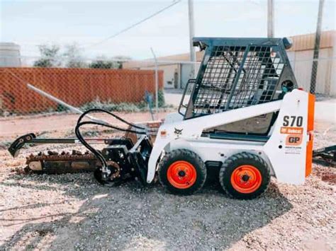 mini skid bobcat|bobcat mini skid steer trencher.